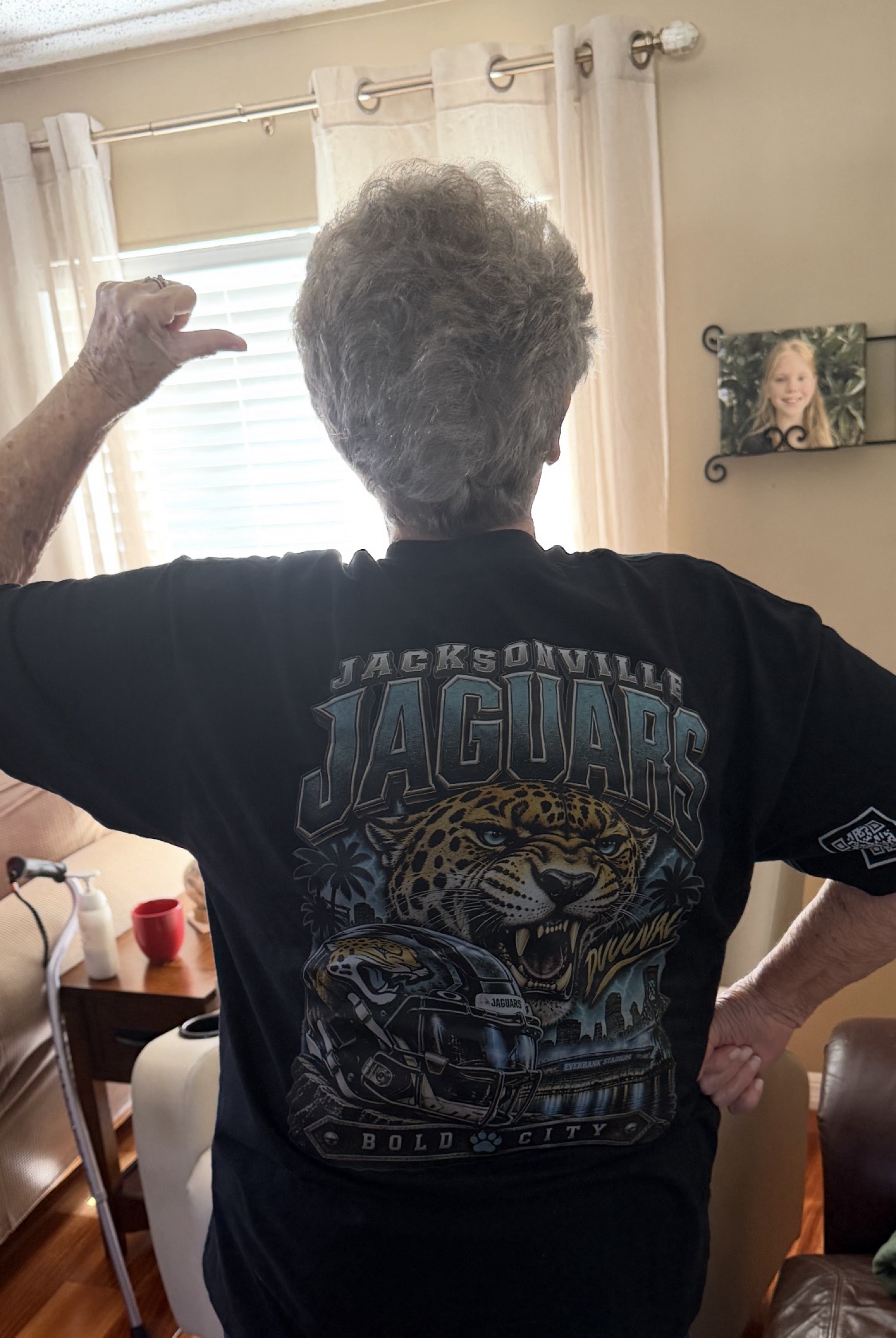Customer wearing Jacksonville Jaguars Bold City shirt