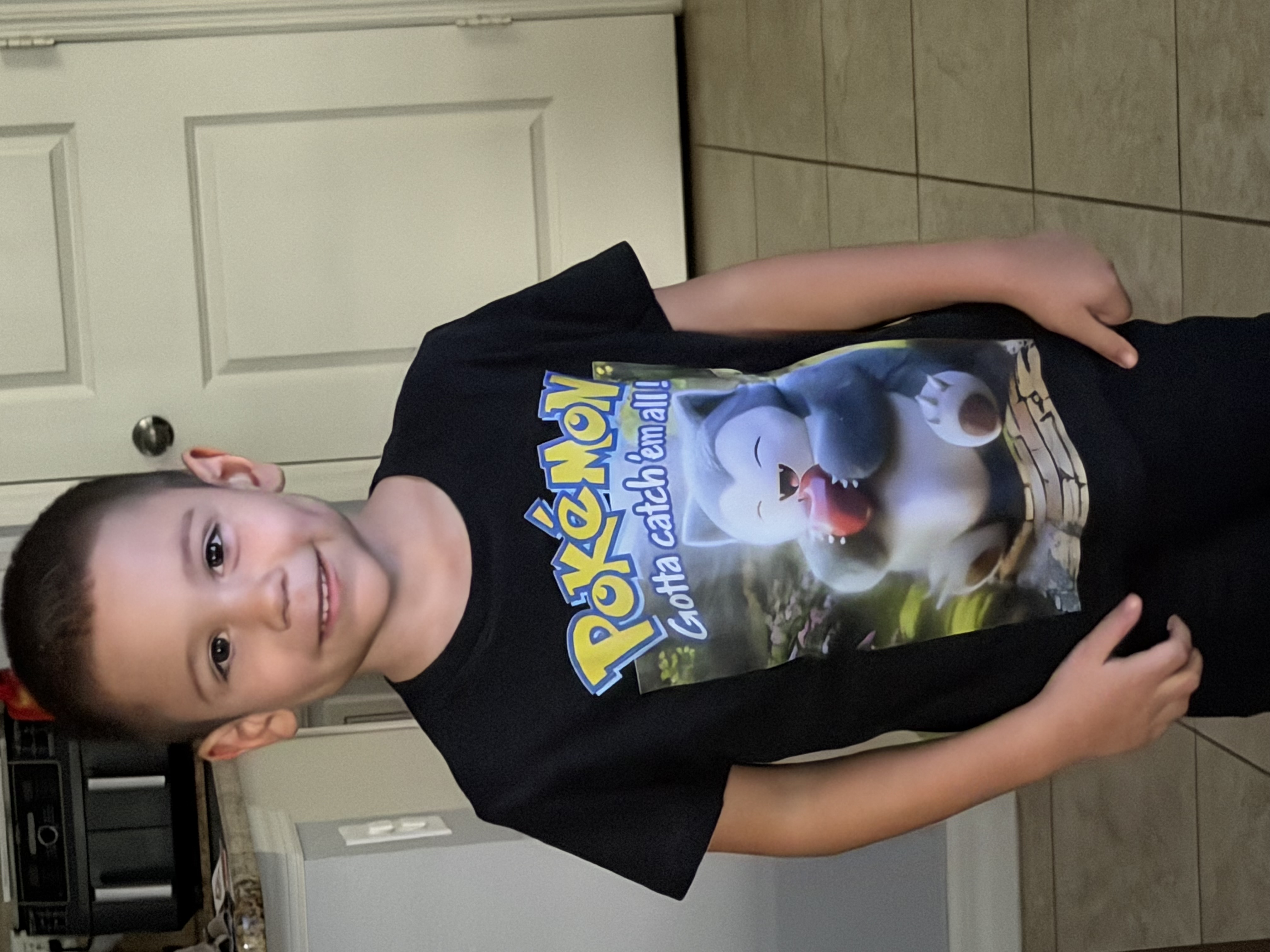 Customer wearing a custom Pokémon Snorlax shirt